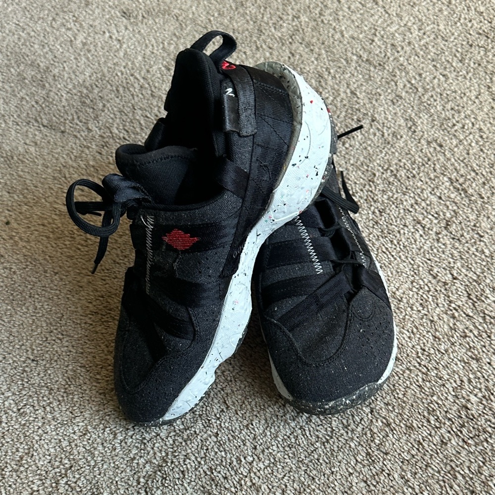 Jordan Carter Nike Black university Sneakers with Speckled White Sole